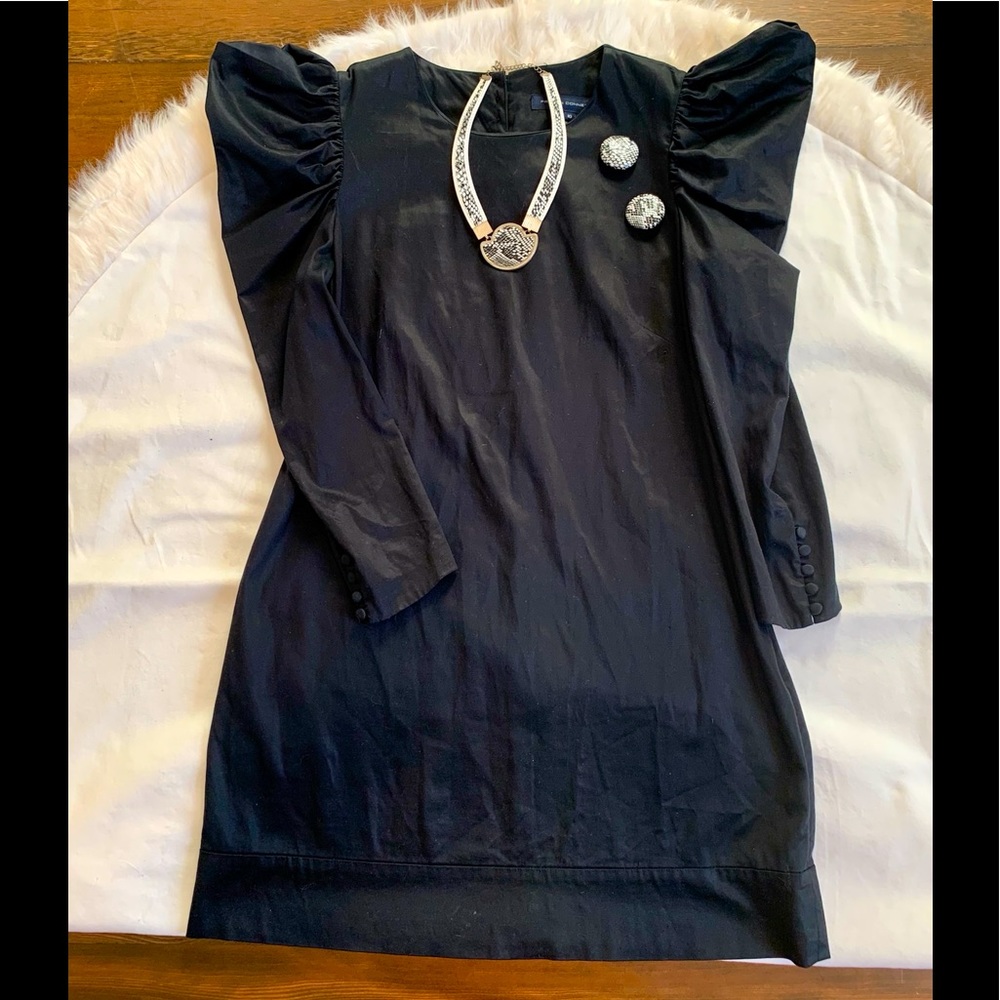 Black dress, puffed sleeves and vintage jewellery
